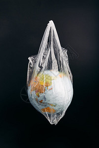 生态垃圾塑料污染和废物的概念全球黑色背景之上的文本复制间距GlobaloverBlackbroorypropyspacefort图片