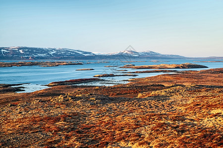 冰岛西部Stykisholmur附近日落时的许多岛屿冰日落时的许多屿斯奈山西方风景优美图片