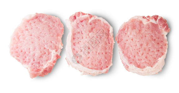 丰富多彩的嫩化产品白种背景孤立的三只野猪肉片图片