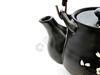 超过黑茶壶白背景的黑茶壶锅传统的图片