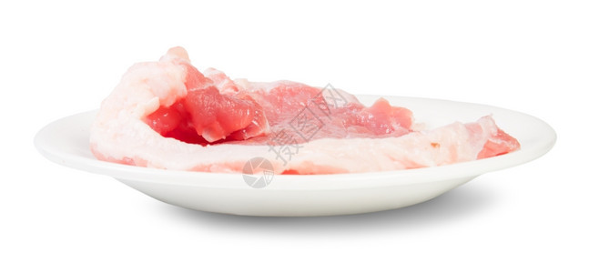 新鲜的稀有炸肉排RawPorkSchnitzel白板旋转的色背景图片