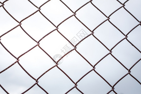 建造关联监狱村里栅栏铁笼的背景背景图片