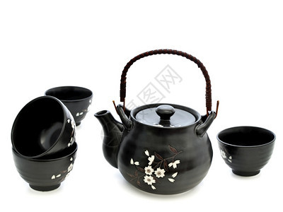 桌子厨具白背景茶叶仪式的瓷餐具传统的背景图片