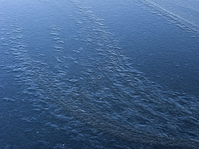 冷冻池塘新的蓝冰表面背景水池敷抽象的图片