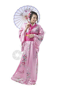 东方年轻的亚洲白背景时穿传统服饰用伞状装的日本年轻女子长满身影女郎图片