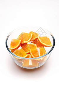 茶点维他命吃橙子在白色背景上切橙子图片