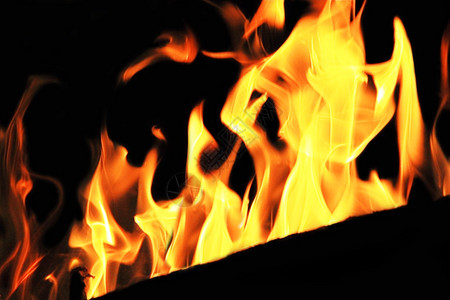 黑色背景上红火焰的图像Name炉红色的燃料图片