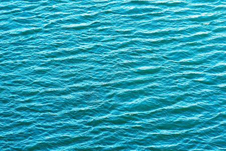 具有温柔波纹的海洋浪形成背景水液体深的图片