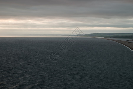 股票墙旅行Chesil海滩多塞特郡背景图片