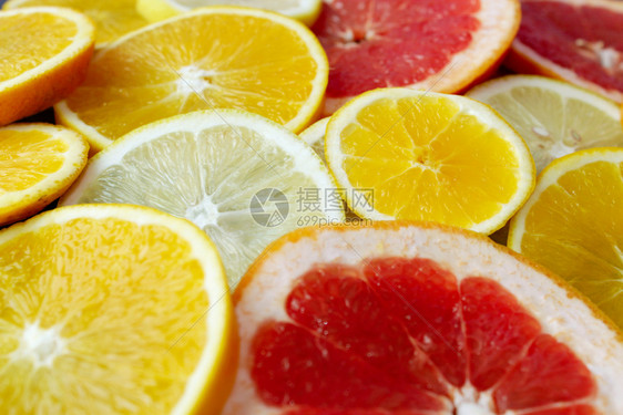 果汁明亮的橙红葡萄油和柠檬切大量橙色葡萄油和柠檬片切门户14图片