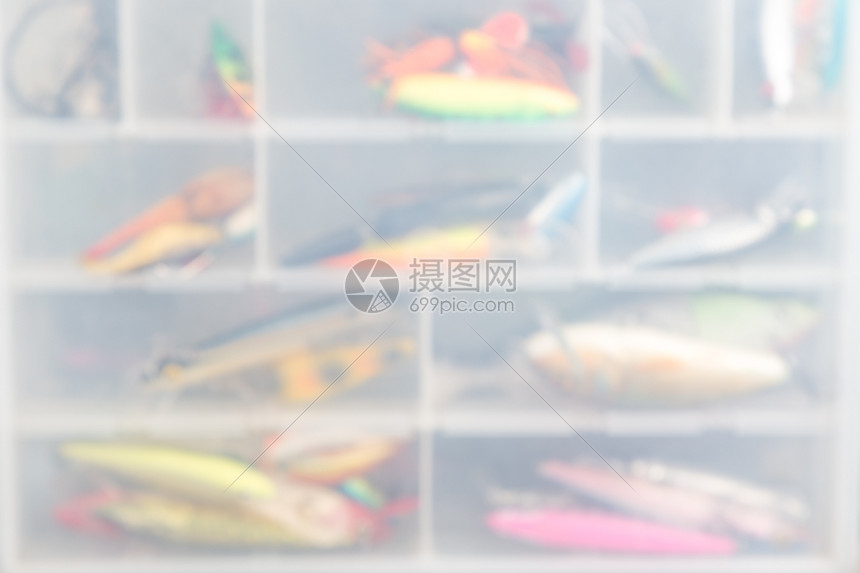 储存箱中模糊的捕鱼诱饵和编织物用于户外广告猎人等的设计背景抢劫者钓鱼配件图片