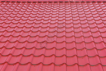 现代光亮的深红色屋顶瓷砖纹理背景质地排工业的图片