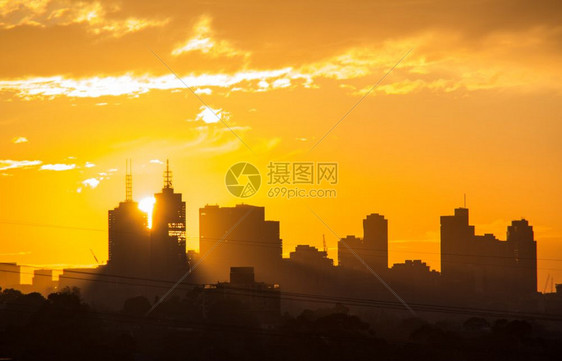 建筑学下午太阳在墨尔本市大厦中下定日蓝色的城市景观图片