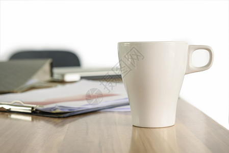 工作营销办公桌上的咖啡杯商业办公室背景概念选择重点和有的拿铁图片