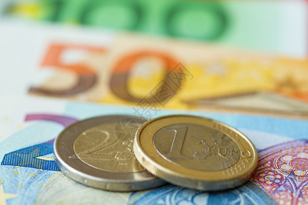 账单百欧元货币硬和钞票的背景欧洲图片