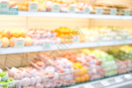 超市水果架子模糊背景图片