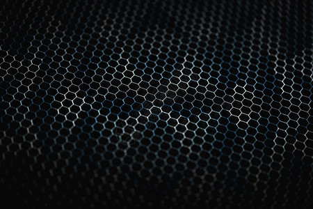 材料炉排技术带有抽象蓝色几何背景的穿孔板状金属纹理图片