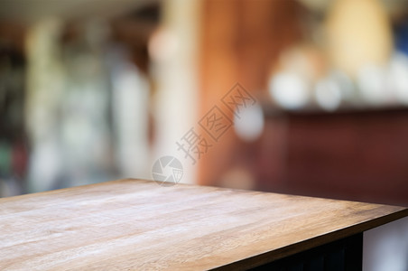 空白的散景柜台颜色模糊的空木制表格餐饮背景图片