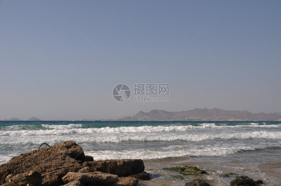 水希腊语位于土耳其高斯的美丽海滩背景图片