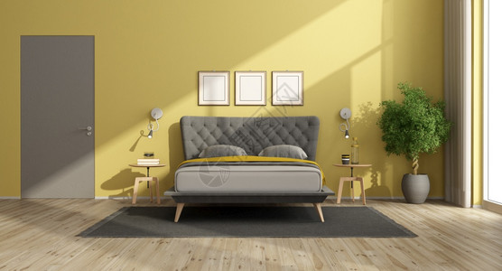 极简主义者现代卧室有黄色墙壁黑灰双床和关闭的门3D制成现代卧室有黄色墙和灰床优雅的现代背景图片