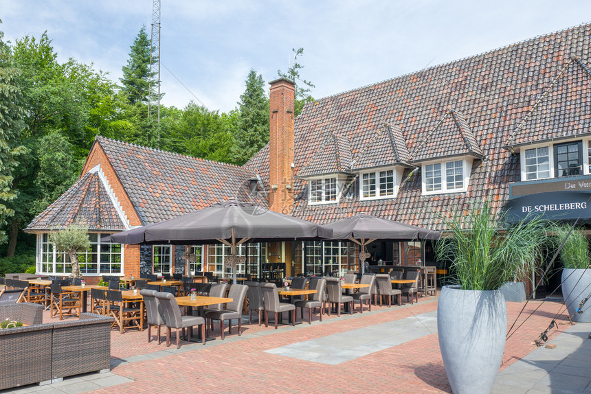 托帕肯历史建造位于荷兰奥特洛的DeScheleberg庄园的Verwennerij餐厅位于图片