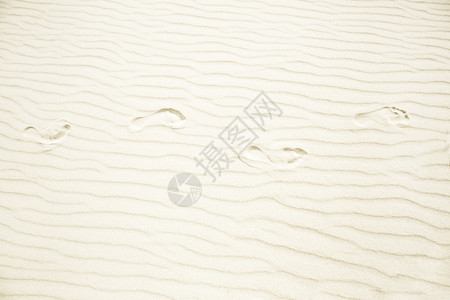 白色的近距离观察水浪形成的彩色条纹沙背景暑假海上日概念以及风波浪状的图片