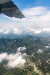 亚洲人高的飞行尼泊尔和喜马拉雅山风景观从飞机到尼泊尔的旅游和行图片