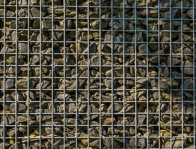 采石场纹理用小头花园建筑背景石块模式填满的网状篮子瓦砾图片