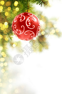 装饰风格发光的圣诞树上红球图片