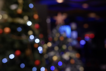 迪斯科圣诞节夜光背景的Bokeh摘要颜色图片