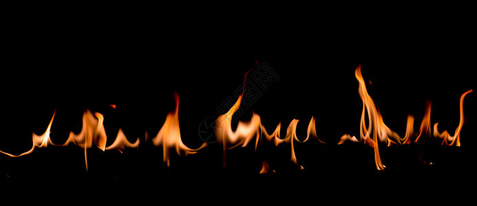 辉光抽象艺术黑色背景的火焰燃烧红色热火花上升烈橙光闪耀的飞行粒子美丽图片