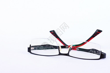 眼力配镜师红色二腹镜片以纯白背景隔离医疗的图片