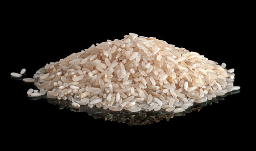 棕色的饮食生粉白大米反射黑色背景粉白大米反射图片