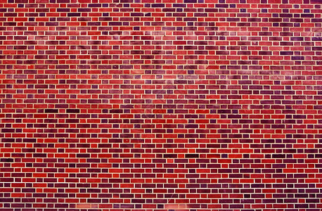水泥红砖墙作为背景无缝的材料图片