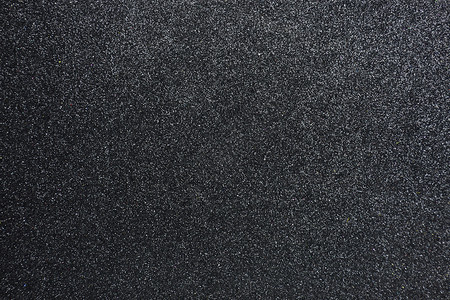 用于演示背景壁纸特写的凹凸不平黑色闪光纹理抽象背景的起疙瘩灰尘背景图片