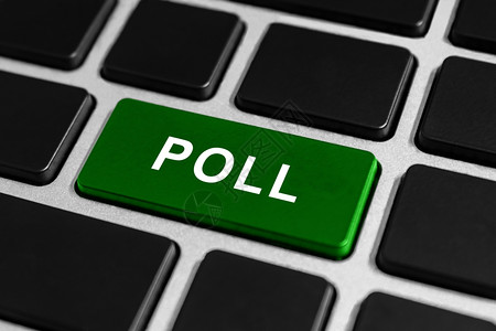 营销键盘业务概念上的绿色按钮派对民意调查背景图片