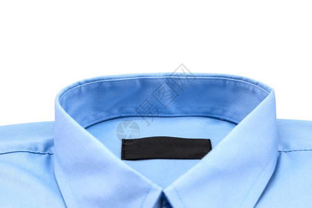 趋势按钮时尚白背景上孤立的蓝色衬衫图片