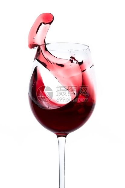 目的酒红色餐厅葡萄酒从玻璃杯中喷出孤立在白色上图片