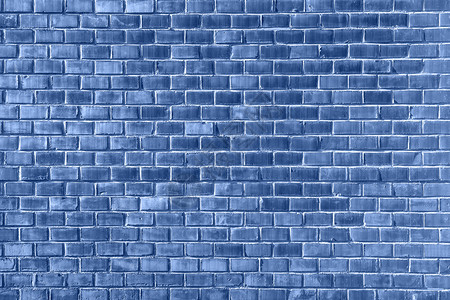 明亮的深蓝色砖板墙纹理关闭顶层视图现代砖墙壁纸设计用于网络或图形艺术项目Trindy标语以经典蓝色挂起20年的颜色深蓝砖墙纹理封图片
