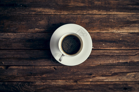 咖啡因喝背景杯的顶端视图白色图片