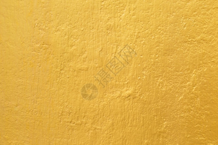 垃圾摇滚画老的水泥墙纹理背景上的金漆图片
