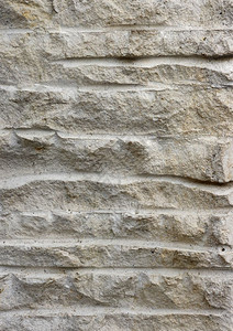 风化石质外部墙壁或生锈建筑楼层的外墙或地表风化石质地外部的老图片