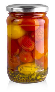 蔬菜白色背景隔绝的玻璃杯中红番茄和黄泡菜白色的图片