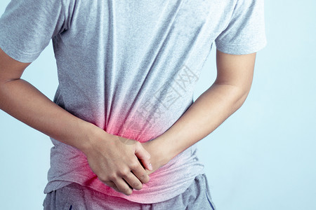 腹部男有胃痛或肠病学健康保概念男人腹痛背景图片