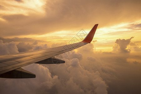 空气旅游日落云边的飞机翼行旅背景奢华自然高清图片素材