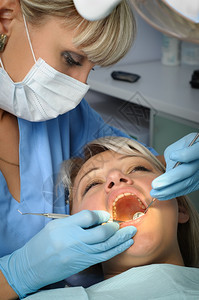做牙齿手术的患者背景图片