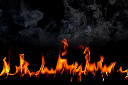黑底烟雾的火焰燃烧红色热火花上升橙发光的飞粒质地运动壁炉图片