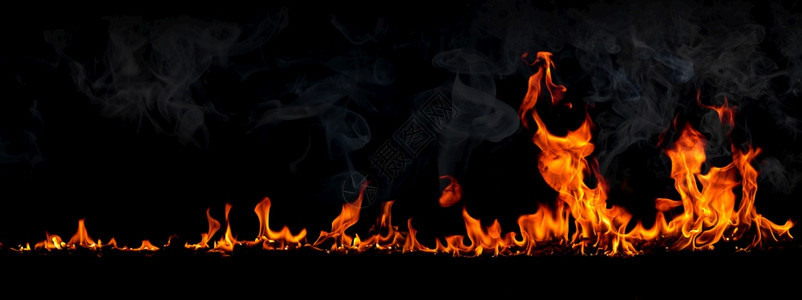 黑底烟雾的火焰燃烧红色热火花上升橙发光的飞粒黑色艺术灾难图片
