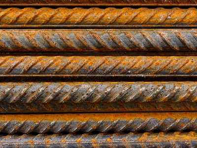 加强行业金属丝化钢棒纹质和生锈工业抽象的加固钢棒以及铁条棒图片