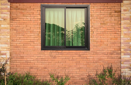 家建筑学砖墙上窗口外侧的视图奢华图片